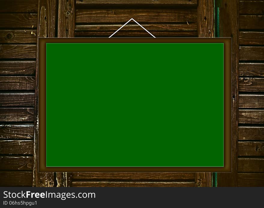 Blank Green Board On Wooden Background