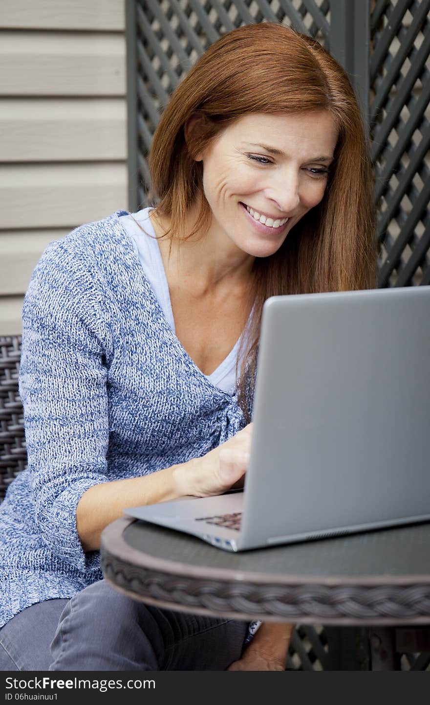 Woman working home on laptop