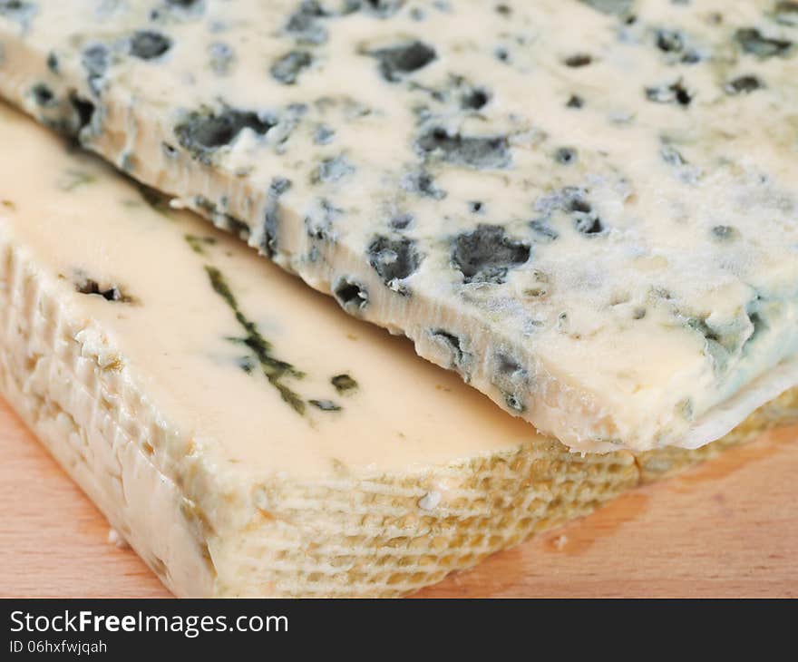 Blue cheese on wooden board