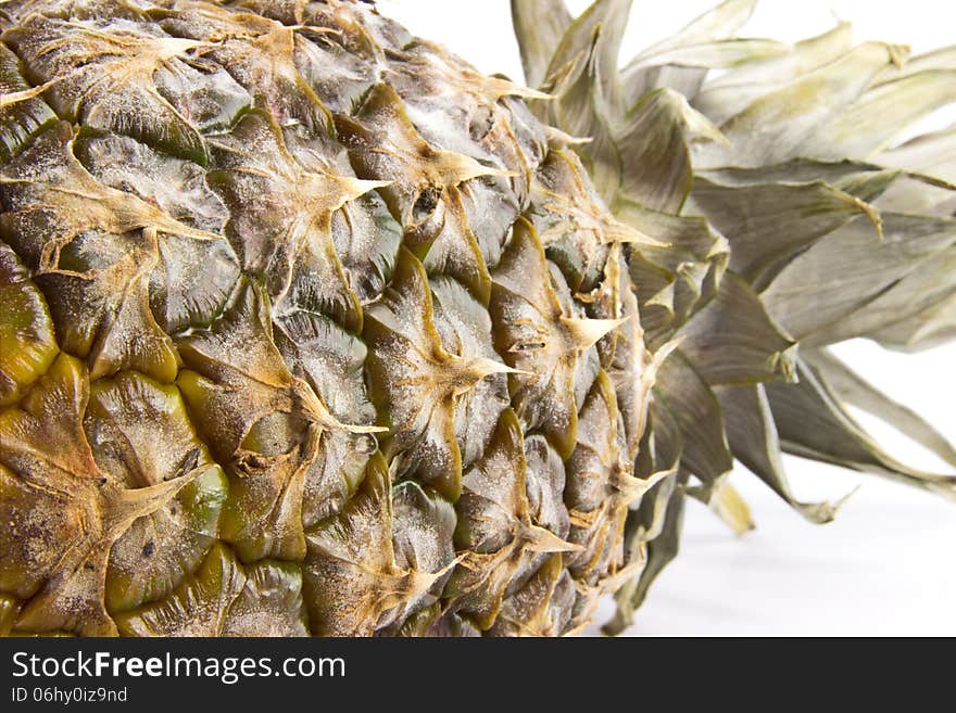 Pineapple closeup isoladed on white background