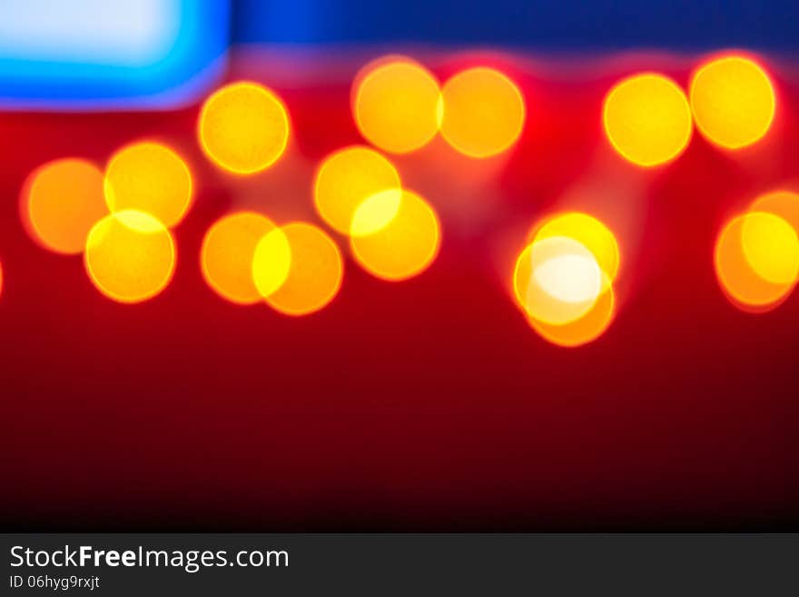 Abstract background of blurred lights with bokeh effect