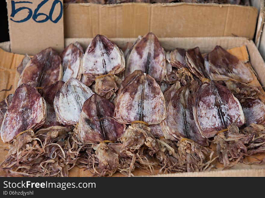 Dried squids for sale in the market, Thailand. Dried squids for sale in the market, Thailand