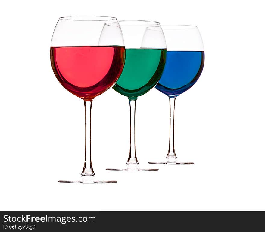 Colorful drinks in wine glasses