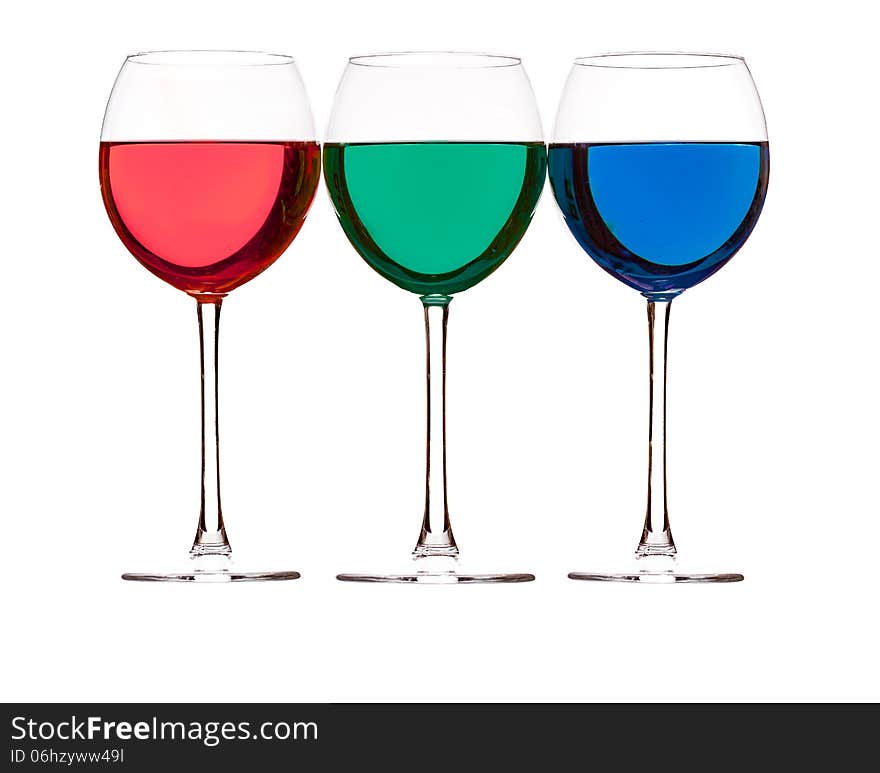 Colorful drinks in wine glasses