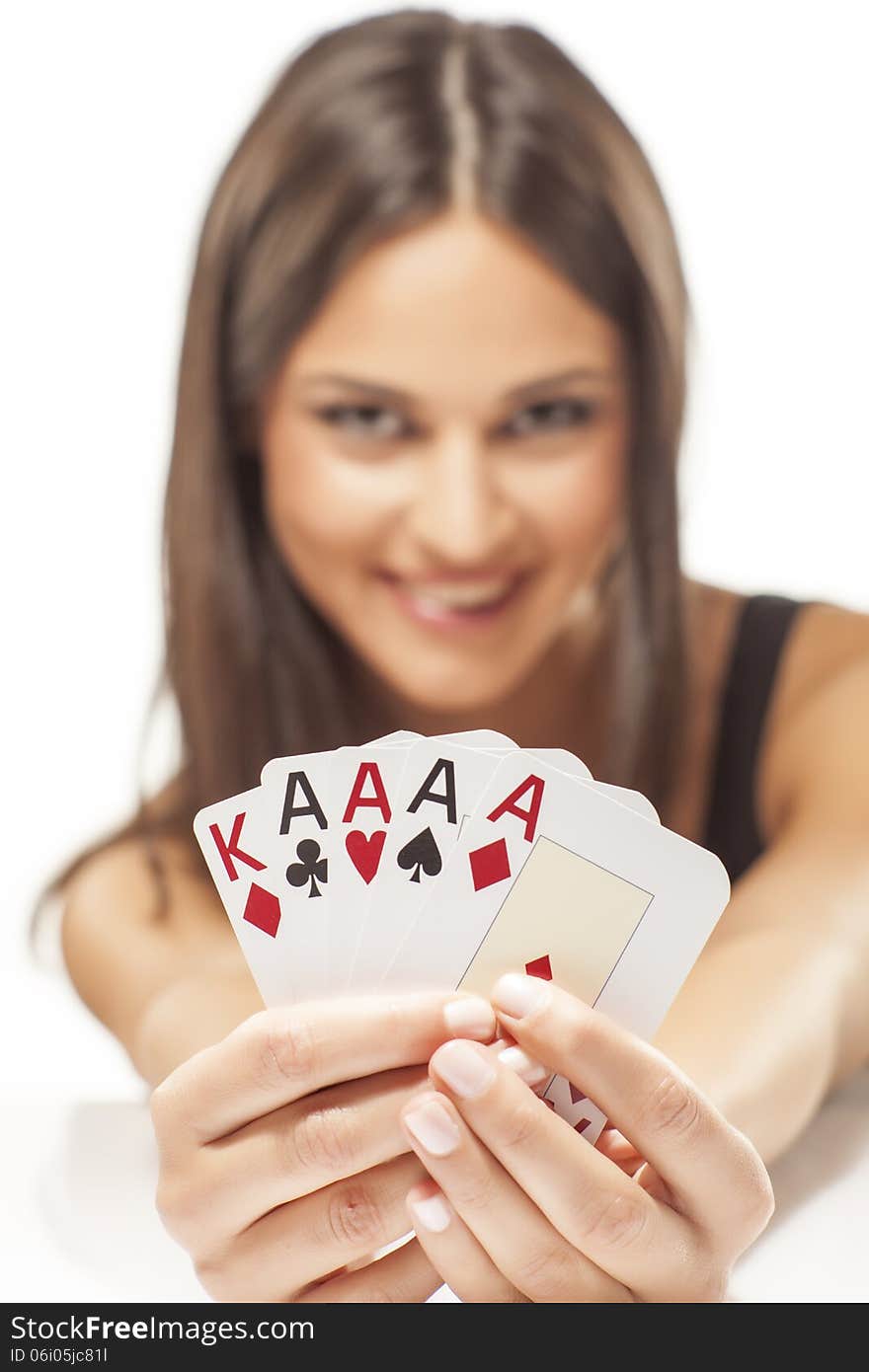 Happy attractive girl holding the winning combination of poker cards. Happy attractive girl holding the winning combination of poker cards