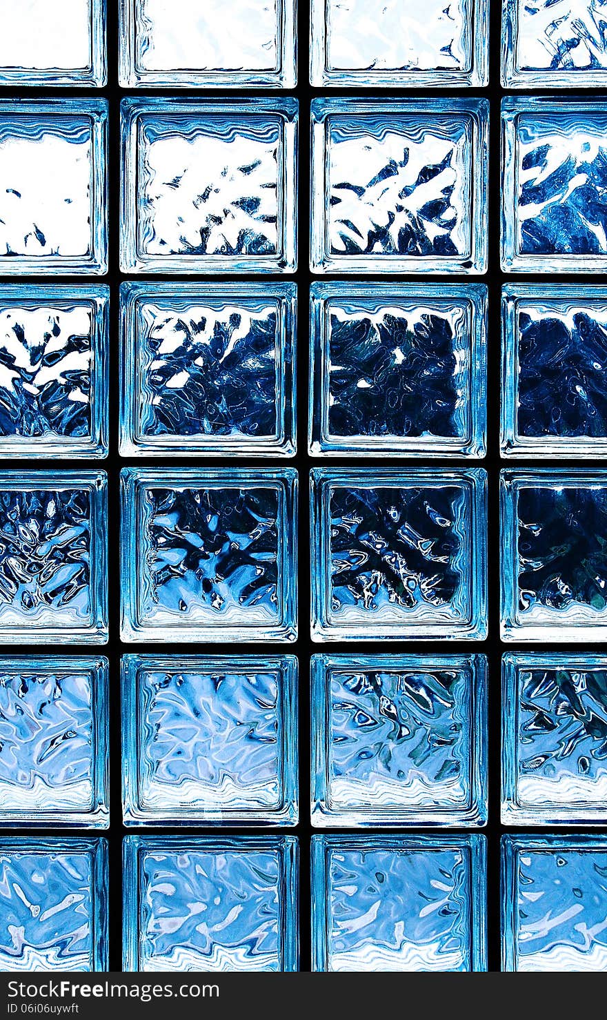 A section of blue tinted glass squares. A section of blue tinted glass squares.