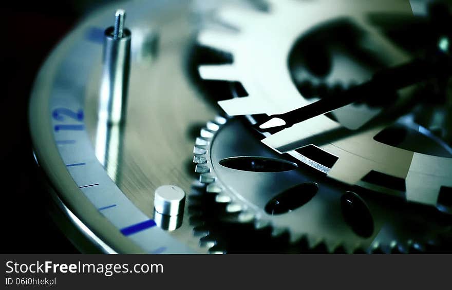 Nice angle of a clock gears. Cinematographic capture.