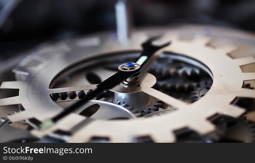 Nice angle of a clock gears. Cinematographic capture.