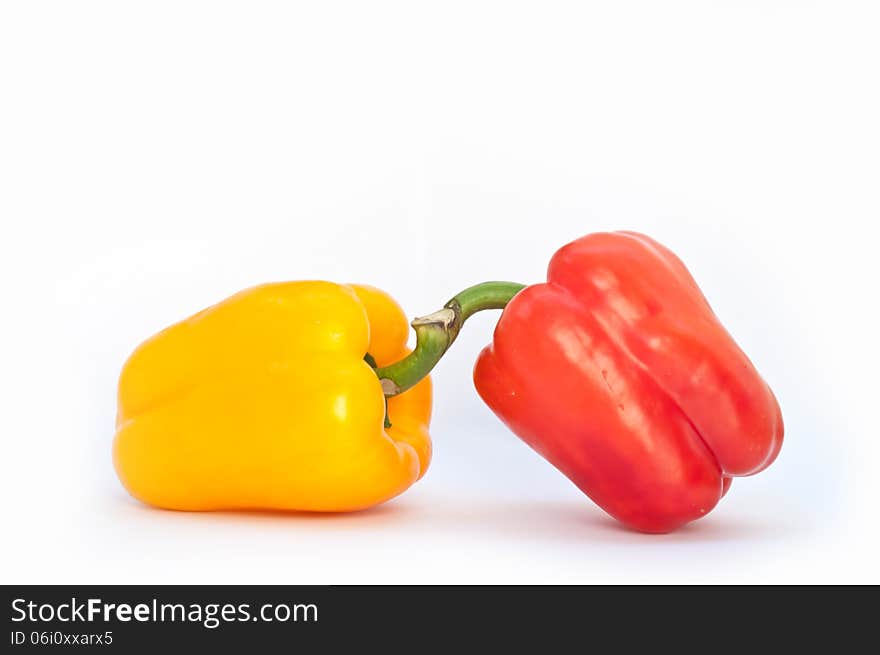 Two Peppers On White Background