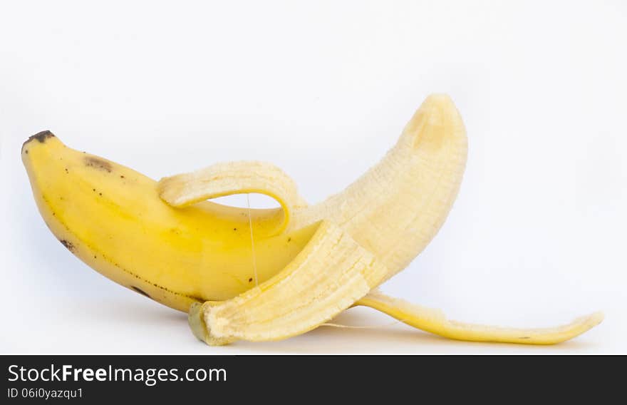 opened banana on white background