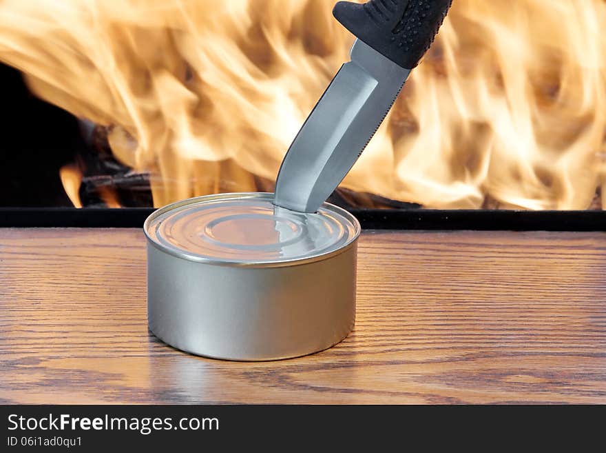 Hunting Knife, Canned meat and flames. Hunting Knife, Canned meat and flames