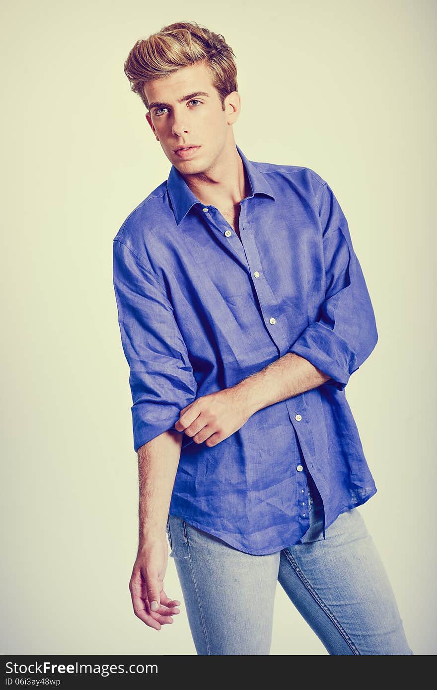 Portrait of handsome blonde man wearing shirt