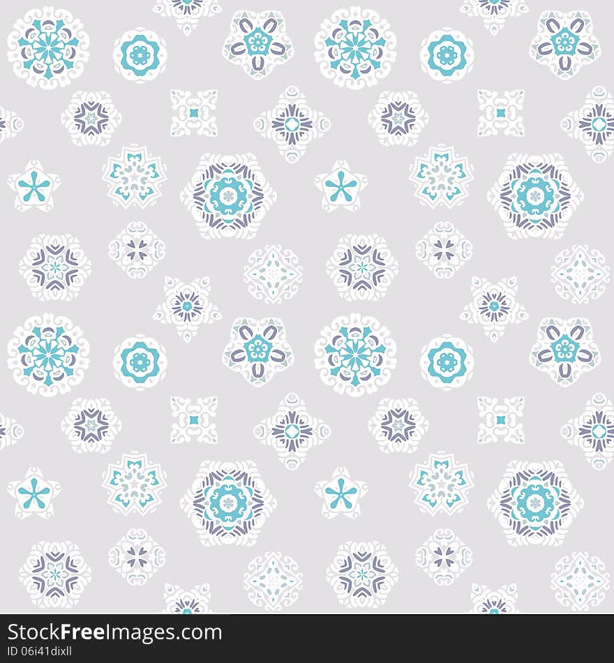 Seamless winter background with snowflakes