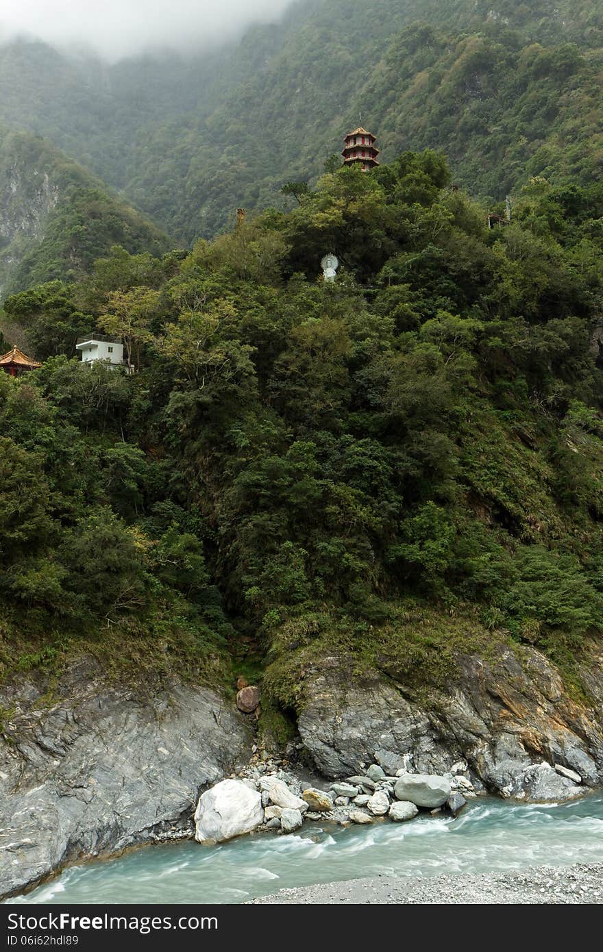 Pagoda And Buddha Statue High At A Mountain In Taroko