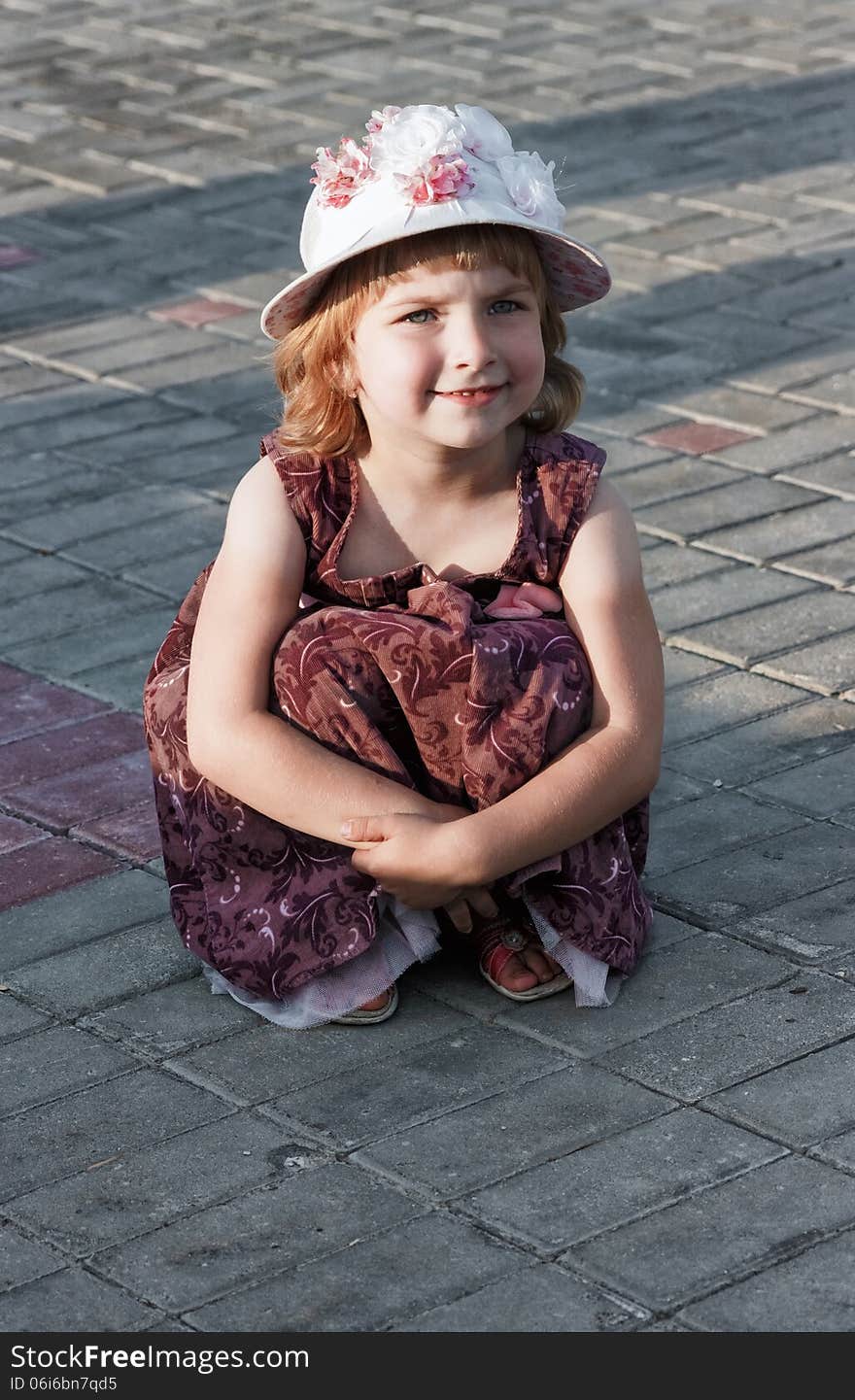 Portrait of the girl in a hat.