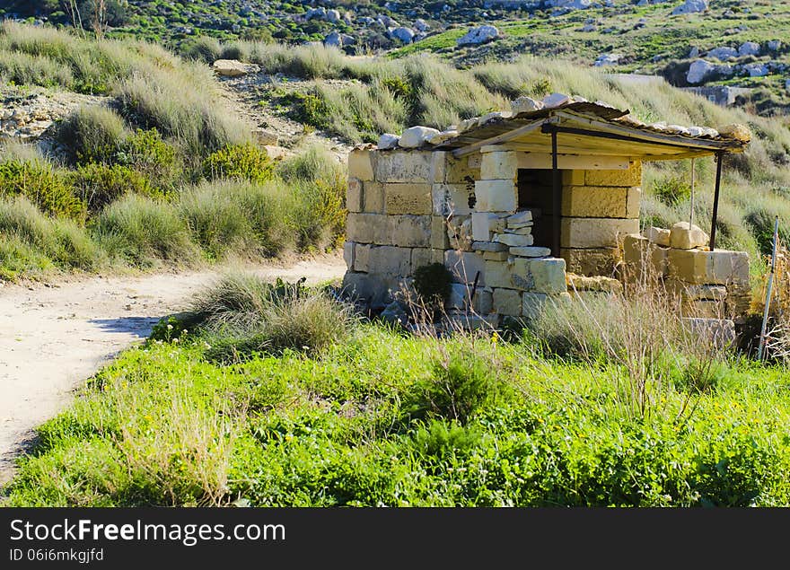 A traditional small hunting post commonly found in the countryside on the island of Malta. A traditional small hunting post commonly found in the countryside on the island of Malta