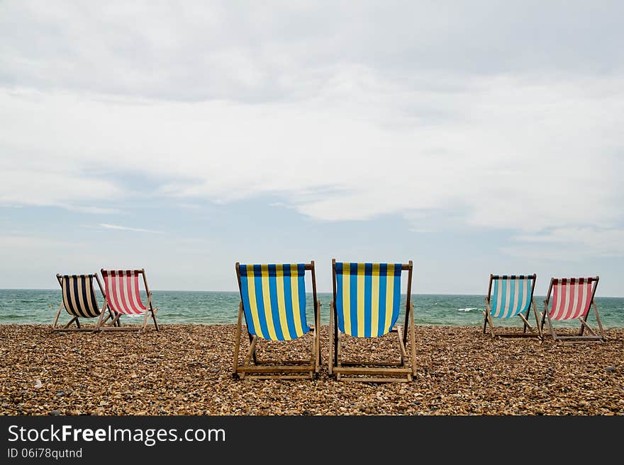 Deck Chairs on Brighton Beach, England