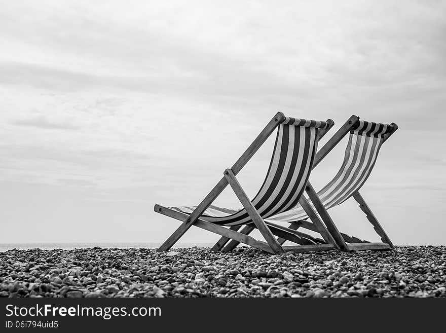 Black and White Deck Chairs on Brighton Beach, England