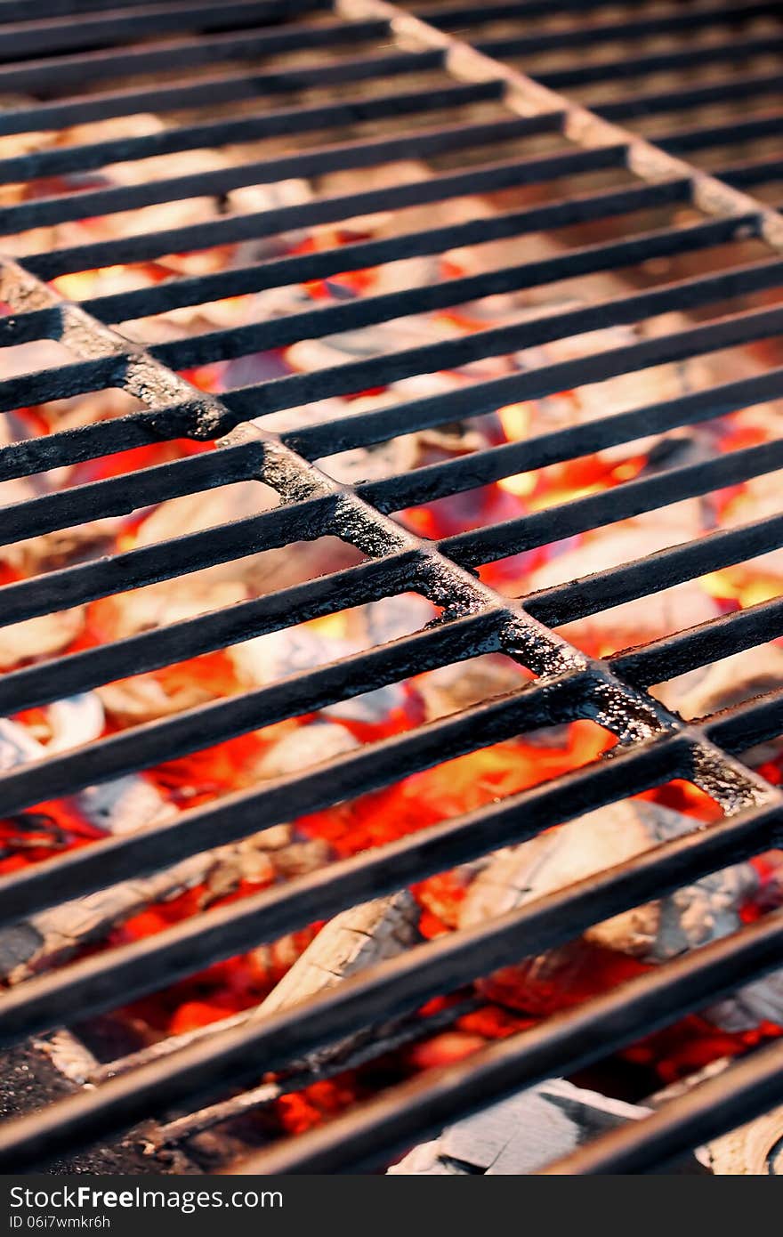 BBQ Hot Cast Iron Grate and glowing coal. BBQ Hot Cast Iron Grate and glowing coal