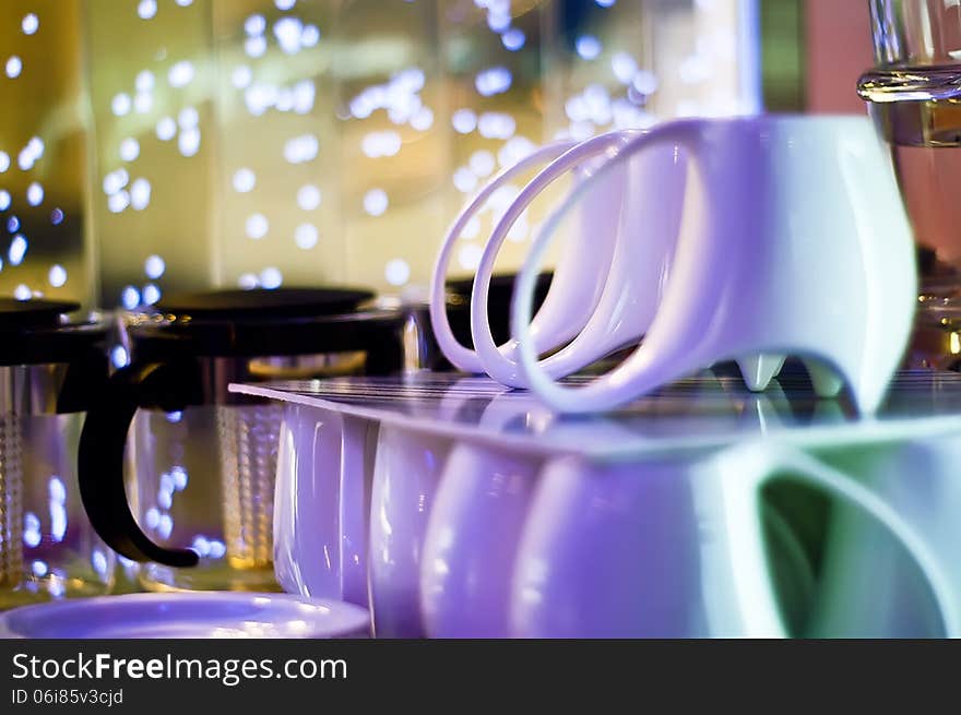 Bunch of coffee cups, close up indoor shot with blurred background