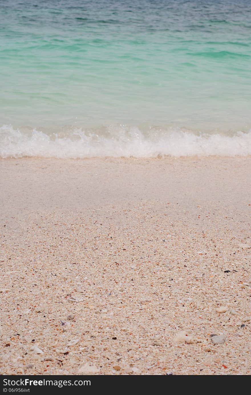 Beach sand and sea water