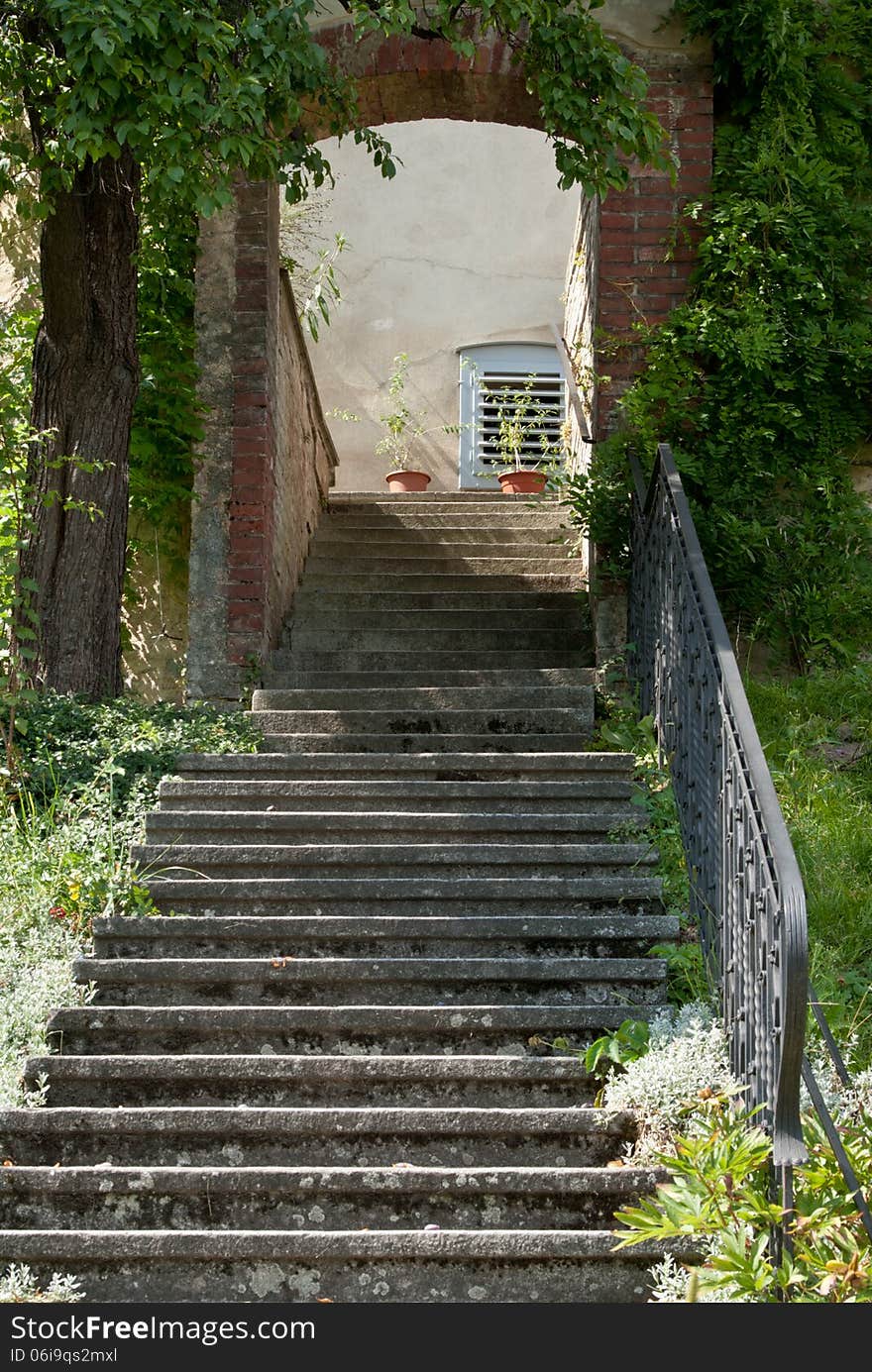 Stone Steps Leading To An Arch