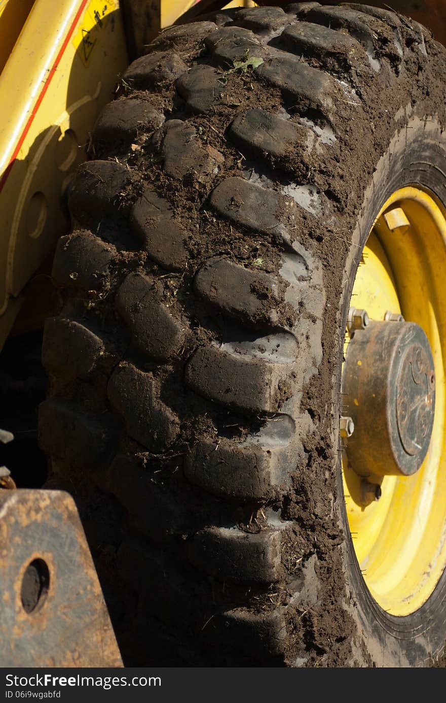 Detailed shot of a stationary digger wheel. Detailed shot of a stationary digger wheel