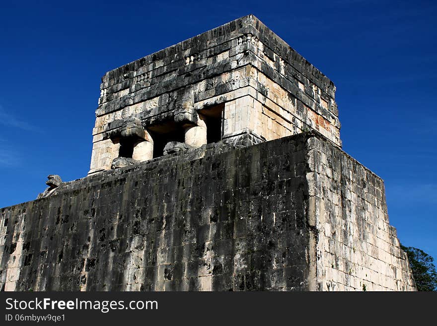 The Upper Temple of the Jaguar overlooks the Great Ball Court of Chichen Itza, Mayan City, Yucatan Peninsula, Mexico. The Upper Temple of the Jaguar overlooks the Great Ball Court of Chichen Itza, Mayan City, Yucatan Peninsula, Mexico