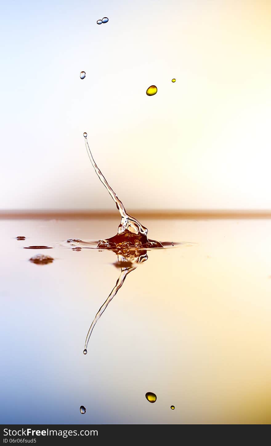 Splashing water drops on color background