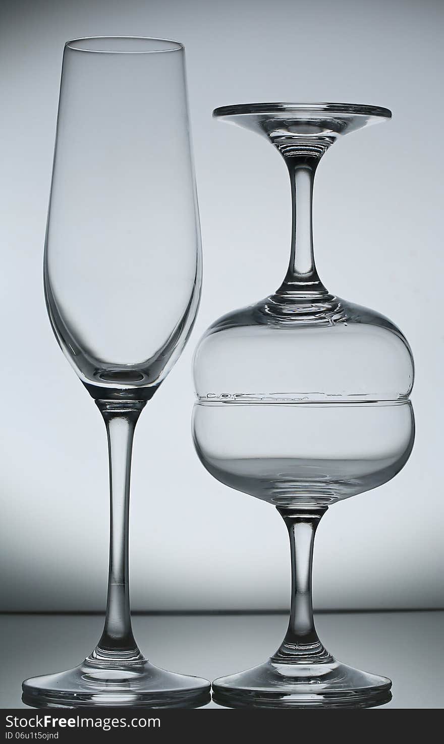 Empty wine glass on gray