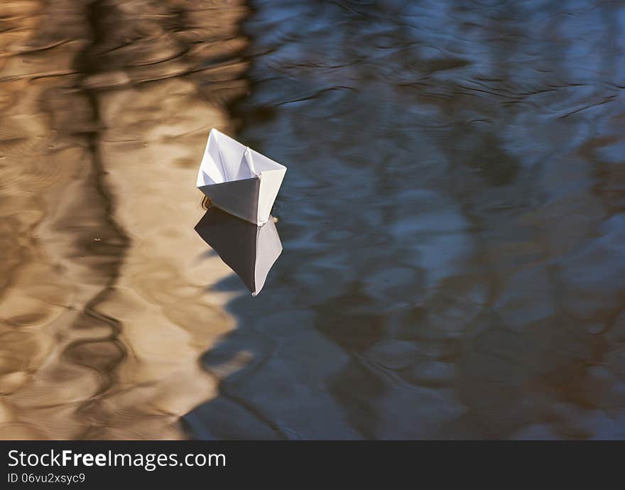 Paper Boat Floating In The Creek