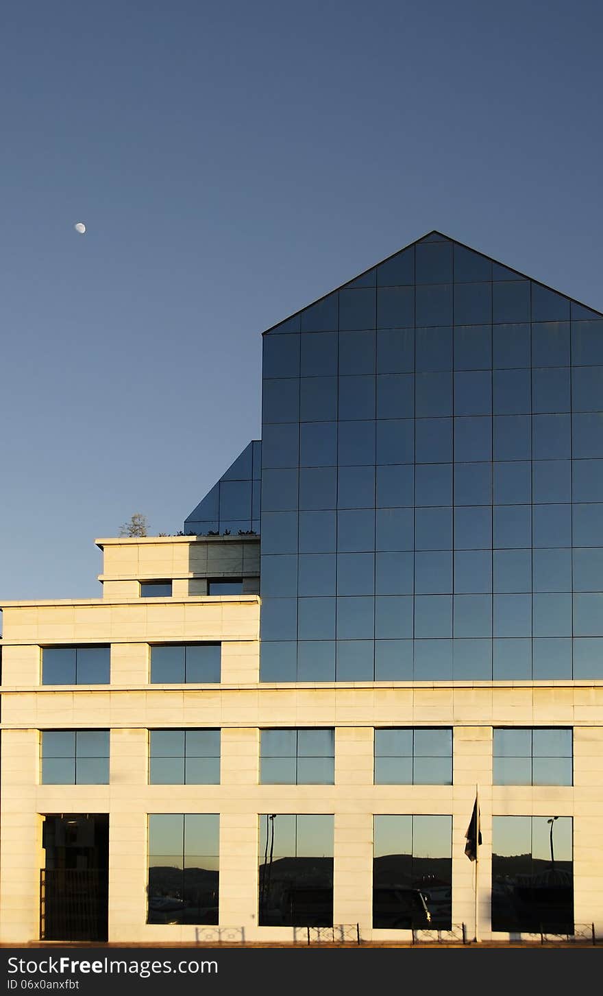 Office building with plate glass walls and gleaming steel and stone made structure in Piraeus ,Greece. Office building with plate glass walls and gleaming steel and stone made structure in Piraeus ,Greece