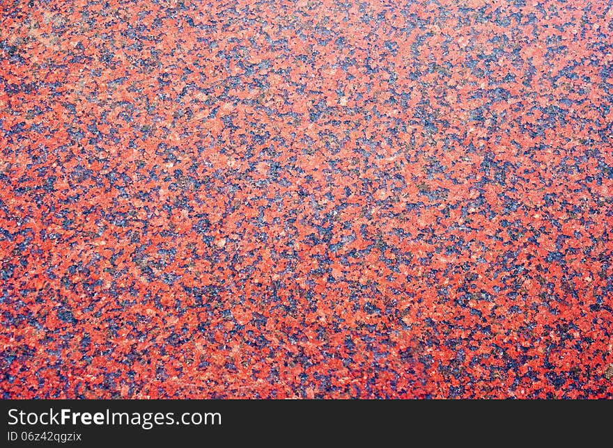 Bright red marble surface as the texture and background