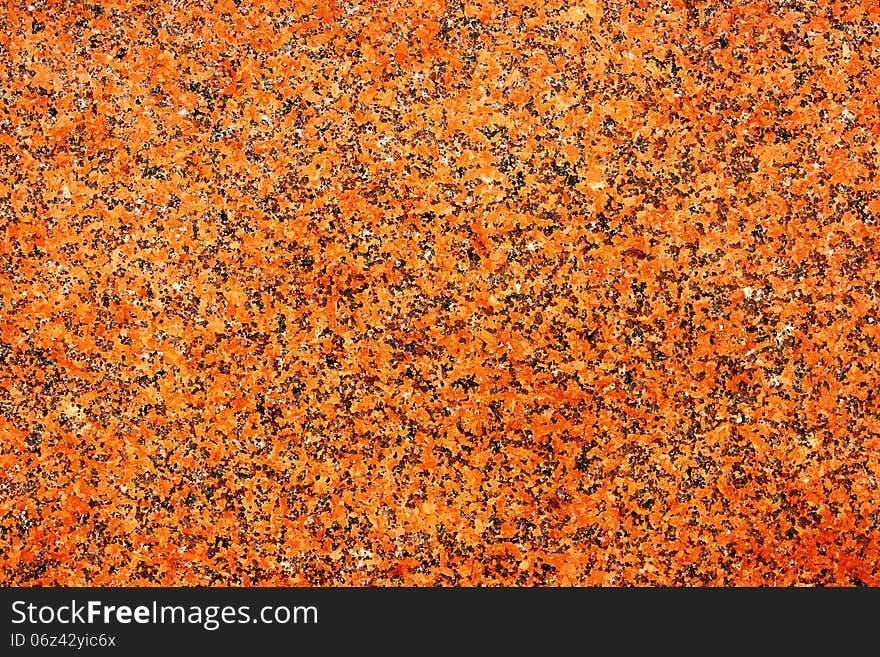 Bright orange marble surface as the texture and background. Bright orange marble surface as the texture and background