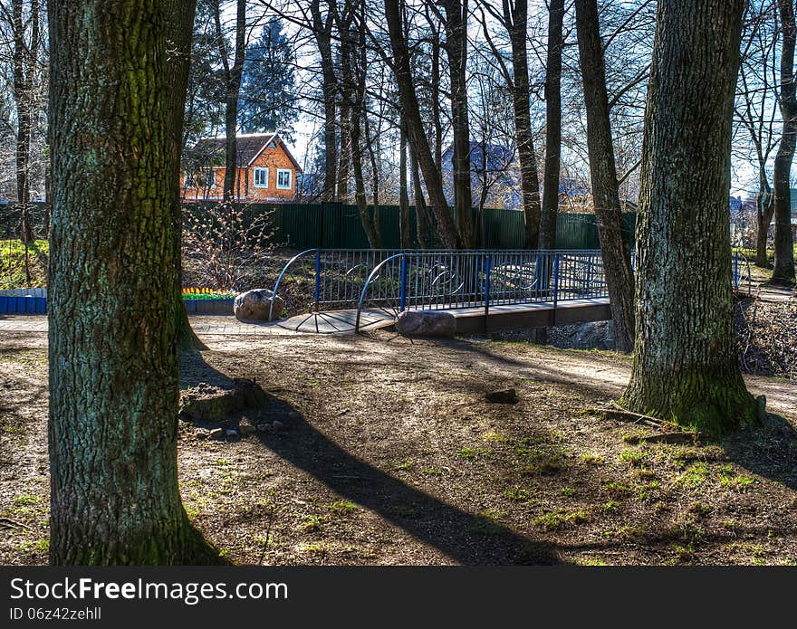 Bridge over a stream in the wood near the house