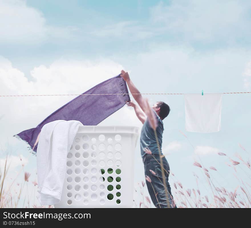 Man With Laundry Background Concept