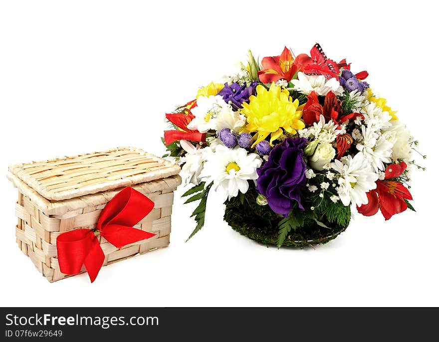 Bouquet of different colors isolated on a white background with a gift box. Bouquet of different colors isolated on a white background with a gift box