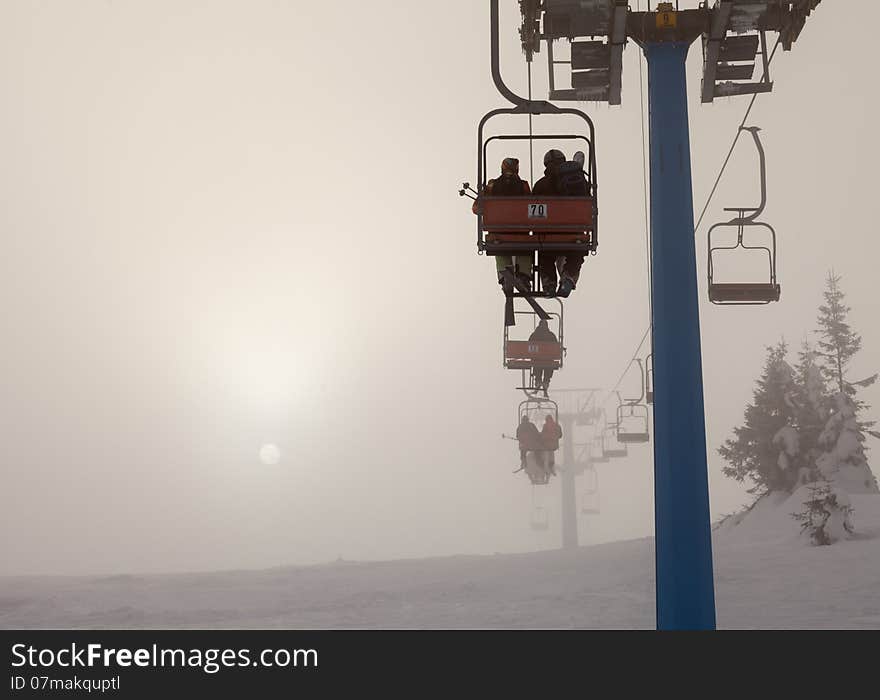 Ski lift, travel, foggy mountains, tourism  winter