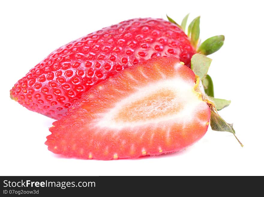 Tasty and useful strawberry on a white background. Tasty and useful strawberry on a white background