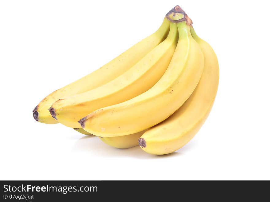 Ripe cluster of bananas on a white background. Ripe cluster of bananas on a white background