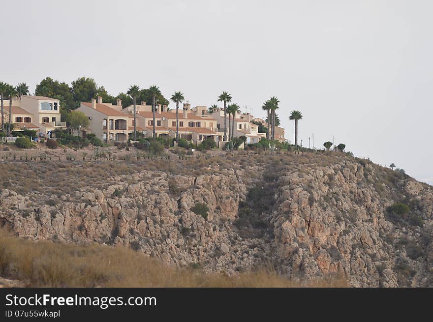 A group of Spanish houses on top of the hill in Alicante. A group of Spanish houses on top of the hill in Alicante