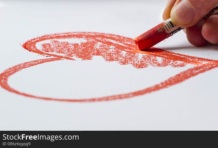 Drawing a sketch of the heart with chalk