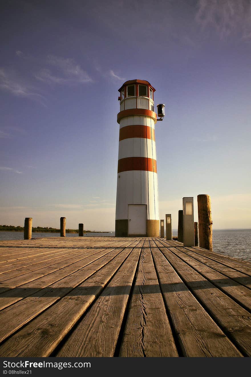 A small lighthouse on the lake in Austria. A small lighthouse on the lake in Austria