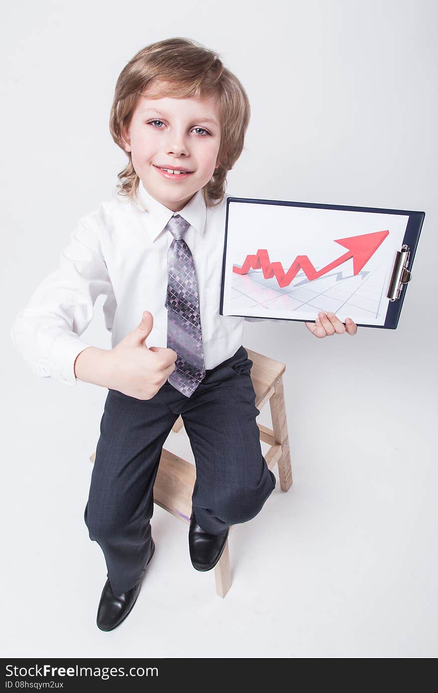 Successful businessman shows a graph of profit growth