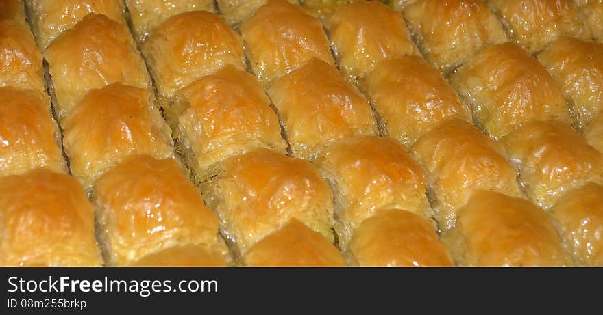 Traditional Turkish dessert 'Baklava' Baklava is a Turkish dessert made with Phyllo dough, nuts, butter, and sugar. Traditional Turkish dessert 'Baklava' Baklava is a Turkish dessert made with Phyllo dough, nuts, butter, and sugar.