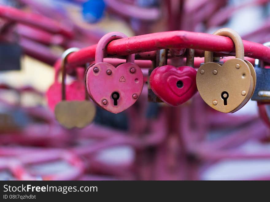 Old padlocks on blurred background