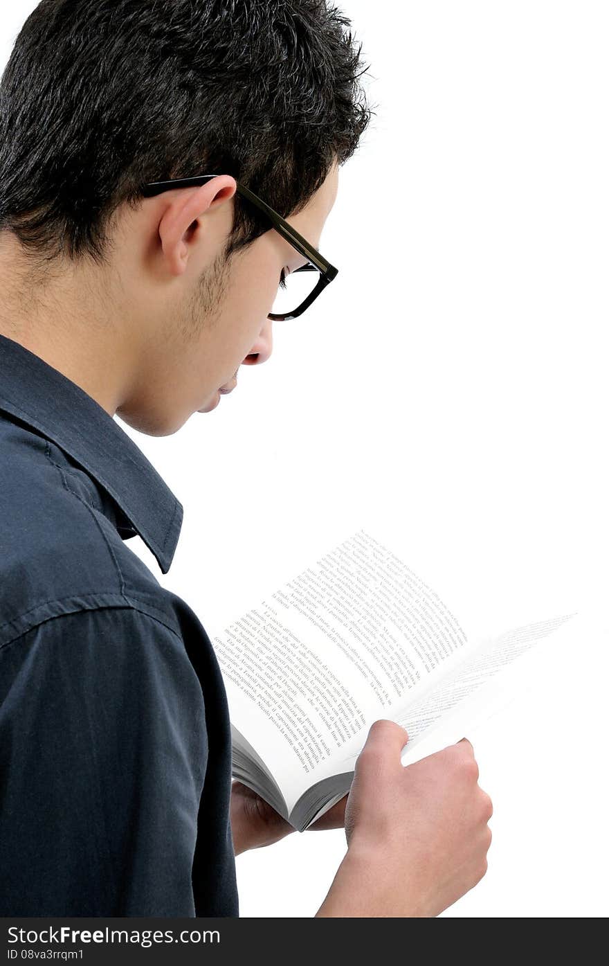 Student reading a book, photographed on white background. Student reading a book, photographed on white background.