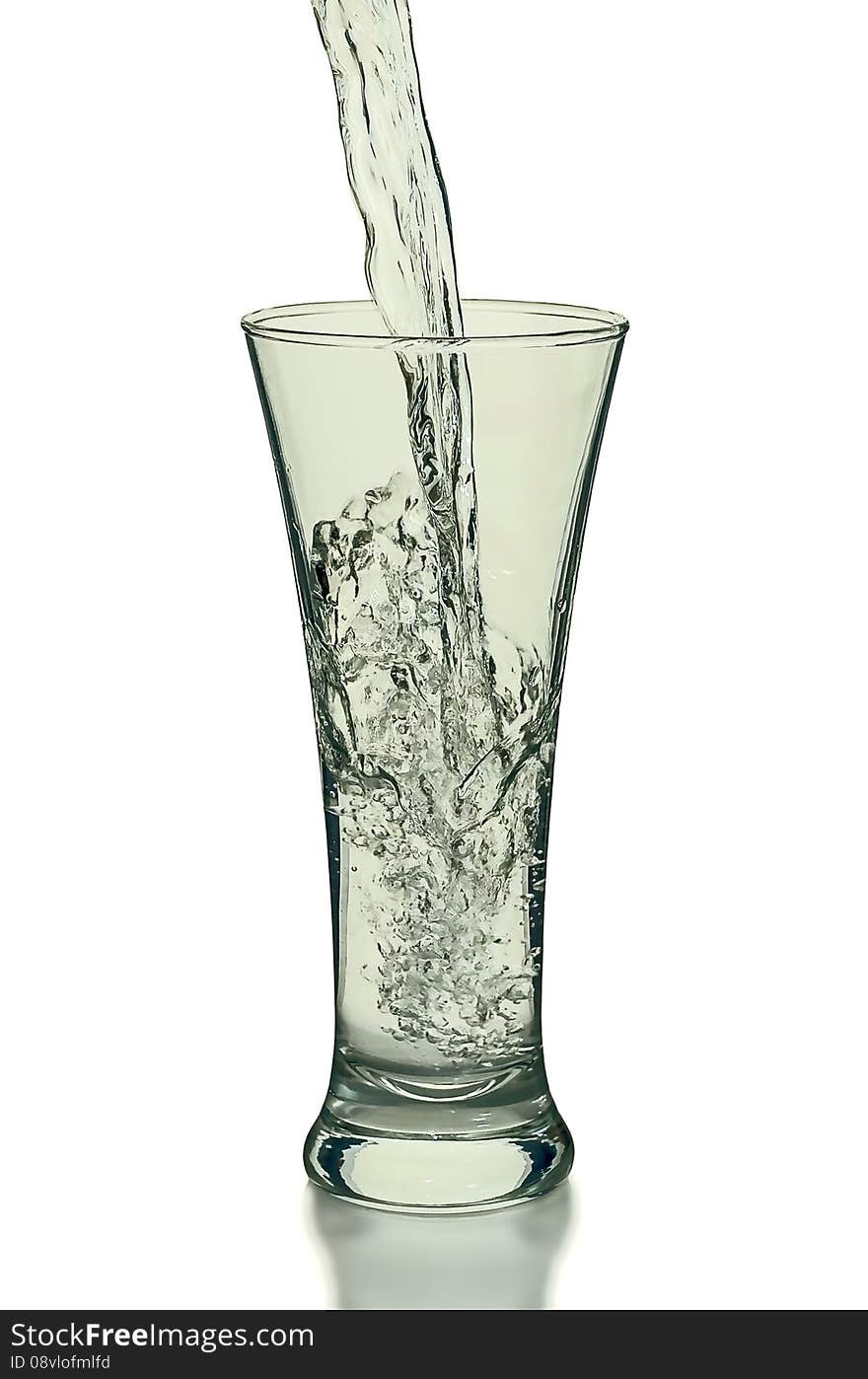 Glass with water splashes isolated