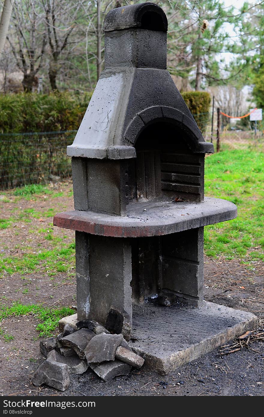 Big stone barbecue in the forest