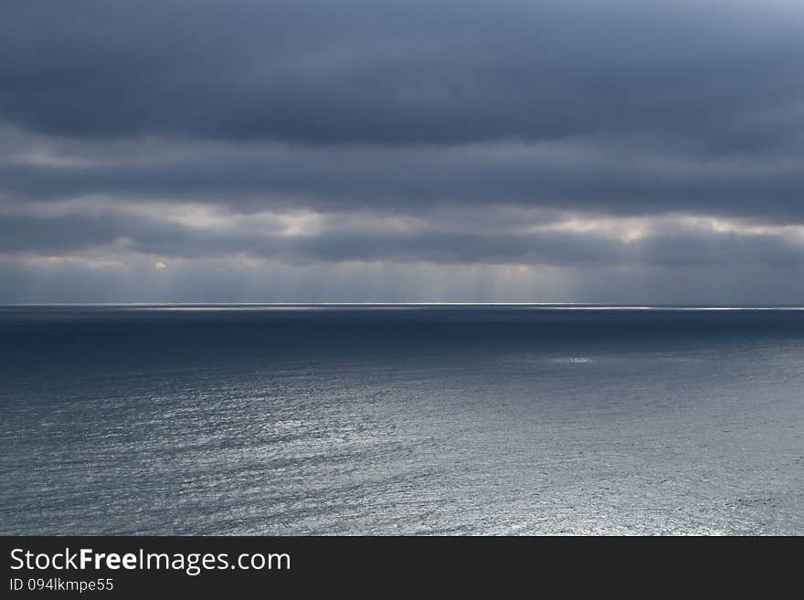 Black Sea, clouds, sun Ray on the surface of the sea